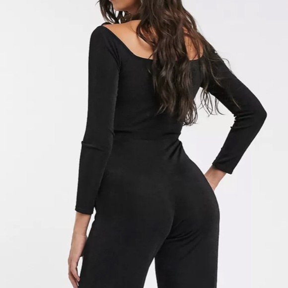 LIKE NEW Black Flare Leg Jumpsuit - Picture 3 of 7